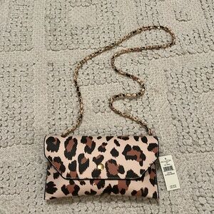 AERI sunglasses case with strap BUT easily can be worn as a crossbody purse!